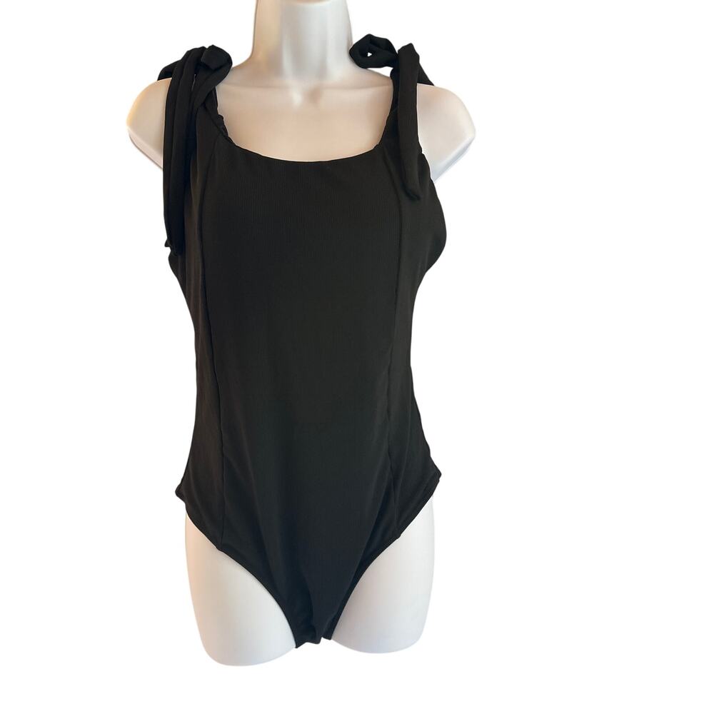 Black tie shoulders one piece swimsuit women’s size large high cut leg NWOT